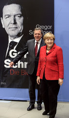 Schroeder + Merkel