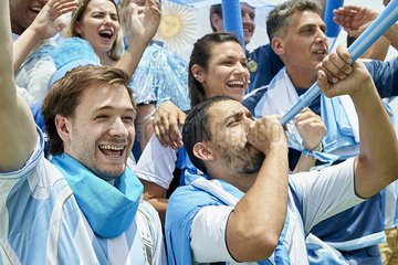 Argentinian football fans watching football match