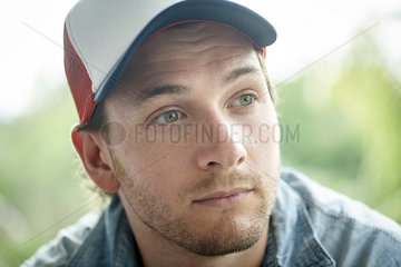 Man wearing baseball cap  portrait