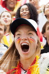 German football fan cheering at match  portrait