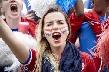 French football fan cheering at match  portrait