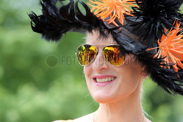 Royal Ascot  Fashion  woman with hat and sunglasses at the racecourse