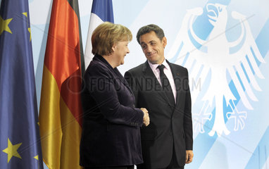 Merkel + Sarkozy