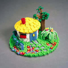 Hut and garden model made from extruded playstuff  1996.