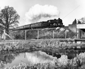 Standard class locomotive crossing the Basingstoke Canal  2 January 1965.