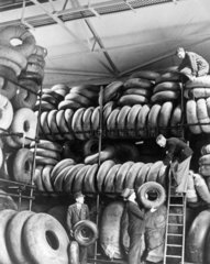 Men working at a Royal Air Force tyre store