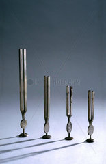 Four tuning forks  c 1841-1930.