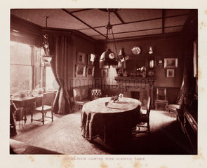 Dining-room lit with electric light  1884.