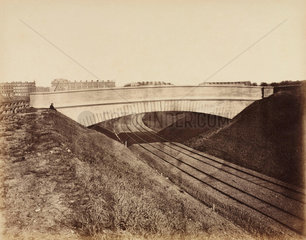 Bridge over the Metropolitan District Railway  Earls Court  London  c 1867.