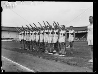German athletes giving Nazi salute at White City  London  1933.