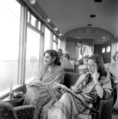 Two ladies from Pakistan travelling to Devon on the ‘Devon Belle’  May 1953.