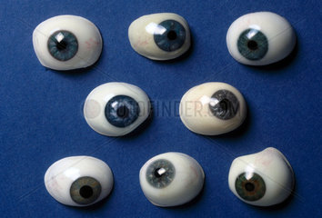 Collection of artificial eyes  French  19th century.