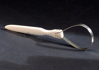 Silver and ivory tongue scraper  English  c 1800.