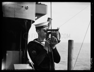 Sailor with signalling lamp  1939.