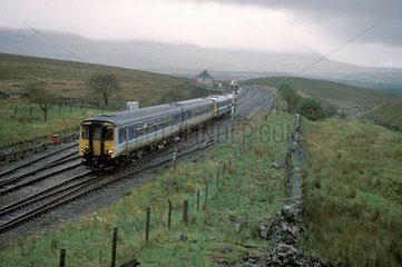 Train going past signals  Blea Moor  1994.