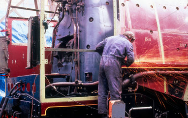 Working on the ‘Duchess of Hamilton' steam locomotive  c 1980s.