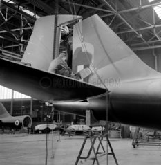 Fitting rudder to Canberra 8 aircraft  Preston  1956.