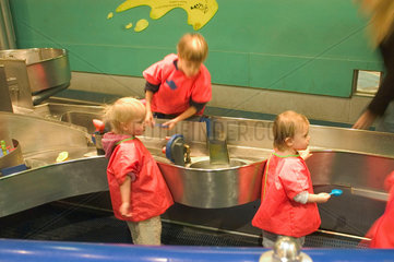 Children playing in The Water Zone  Science Museum  London  2007.