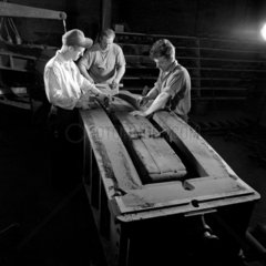 Foundry workers at Carron works make a mould for tunnel segments  Falkirk.