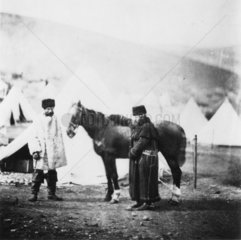Colonel Lowe and servant in winter dress  c 1855.