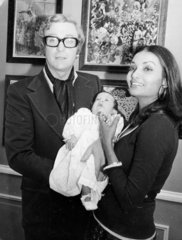 Michael Caine with wife and baby  November 1973.