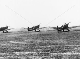 Three Spitfires at a Fighter Command statio