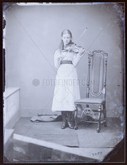 Xie Kitchin with violin  1875-1880.