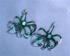 Opal and green/purple tantalum earrings  1976.