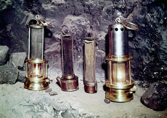 Two ‘bonneted’ clanny lamps and two clanny lamps  c 1880s.