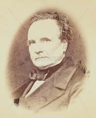 Charles Babbage  mathematician and pioneer of machine computing  c 1860.