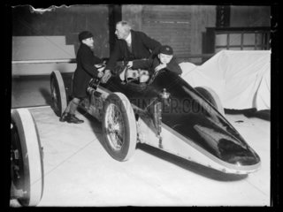 Two schoolboys admiring a racing car  Schoolboy's Own exhibition  1933