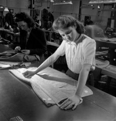 Seamstress measuring a coat  Crewe  1948.