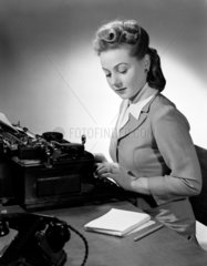 Woman typing  1949.