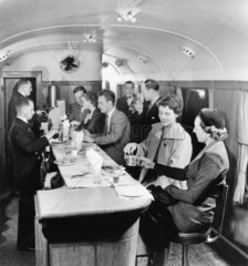 Passengers seated at counter in British Railways Buffet Carriage  1951.
