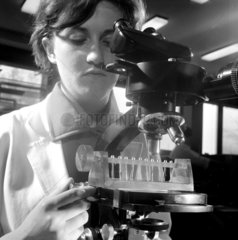 Female worker using optical control in assembly of transistors  1965.