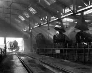 Steam locomotive taking water at York  7 July 1960.
