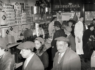 Shoppers waiting to be served at a J Sainsbury store  October 1931.