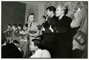 The Beatles at a press conference  with Andy Warhol  New York  1964.
