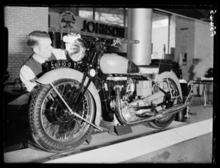 Man polishing a Rudge 500cc Special motorcycle  1937.