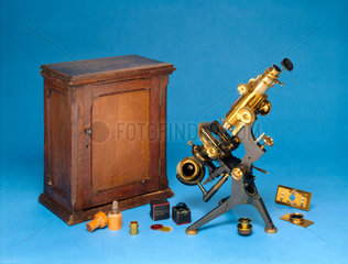Grand Model 'van Heurck' microscope with case and accessories  c 1900.