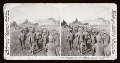 'British Prisoners released by the Boers  marching to Pretoria  South Africa’  1901.