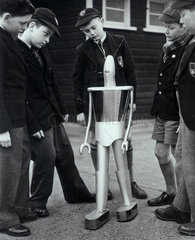 Schoolboys with robot  29 December 1955.
