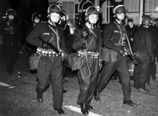 Riot police with plastic bullet guns  Tottenham  London  October 1985.