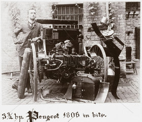 C S Rolls with his 3 3/4 hp Peugeot ‘in bits’  1896.