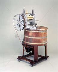 Wooden electrically-driven domestic washing machine  c 1920.