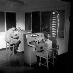 Two engineers making high voltage tests 1955.
