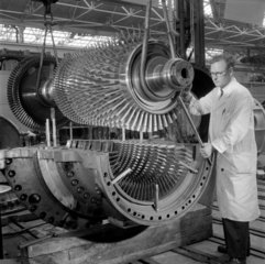 An engineer installs a gas turbine rotor in a case  English Electric   Whetstone.