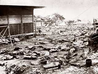 Devastation following an earthquake  Japan  1876.