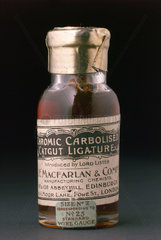 Bottle of sterile catgut ligatures  Scottish  1890-1920.