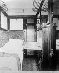 Interior of a LNWR sleeper carriage  1909.